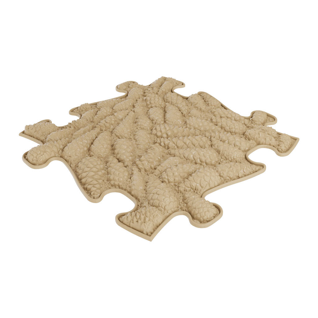 A beige, puzzle-piece shaped sensory playmat designed for children's sensory stimulation and motor skill development.