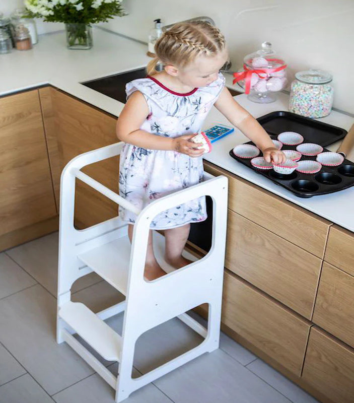 How an Adjustable Learning Tower for Toddlers Improves Independence, Attention and Fun