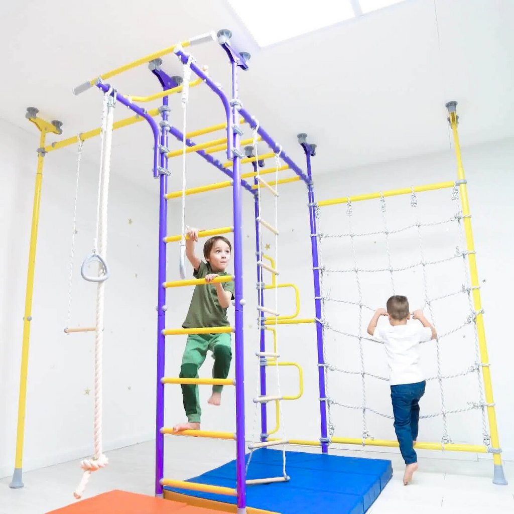 kids playing on monkey bars with sensory swings by Tinnitots