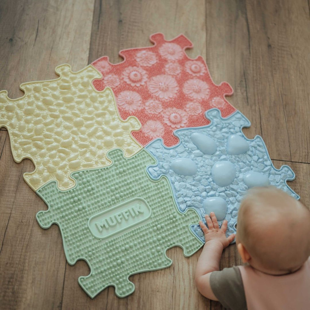 baby playing with Muffik's orthopaedic 4 piece set