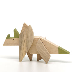 Wooden magnetic triceratops puzzle toy with green accents, a sustainable and educational STEM toy in Australia.