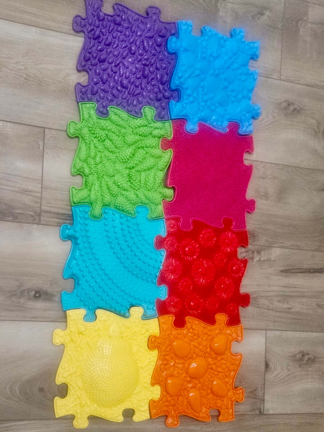 educational rainbow coloured puzzle mats