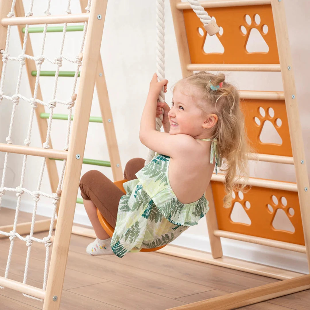 indoor pikler gym with swing