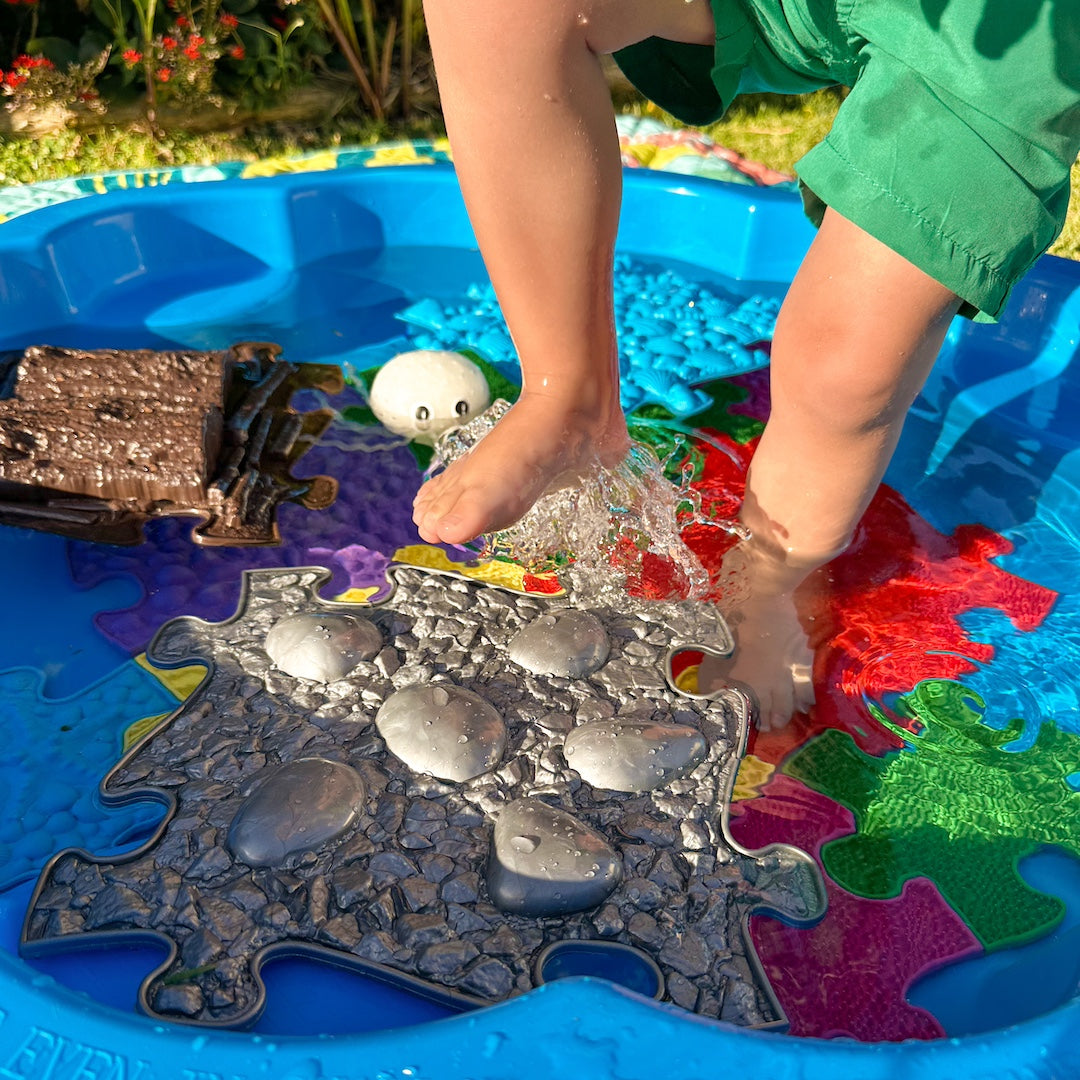waterproof large textured floor tiles dipped in water with kids playing in water