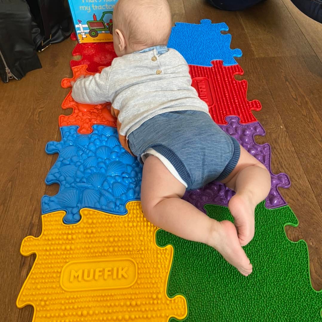 Tummy time mats for babies and toddlers by Tinnitots