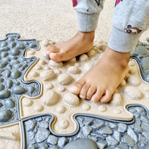 Healthy foot development by podiatrist check Tinnitots sensory playmats